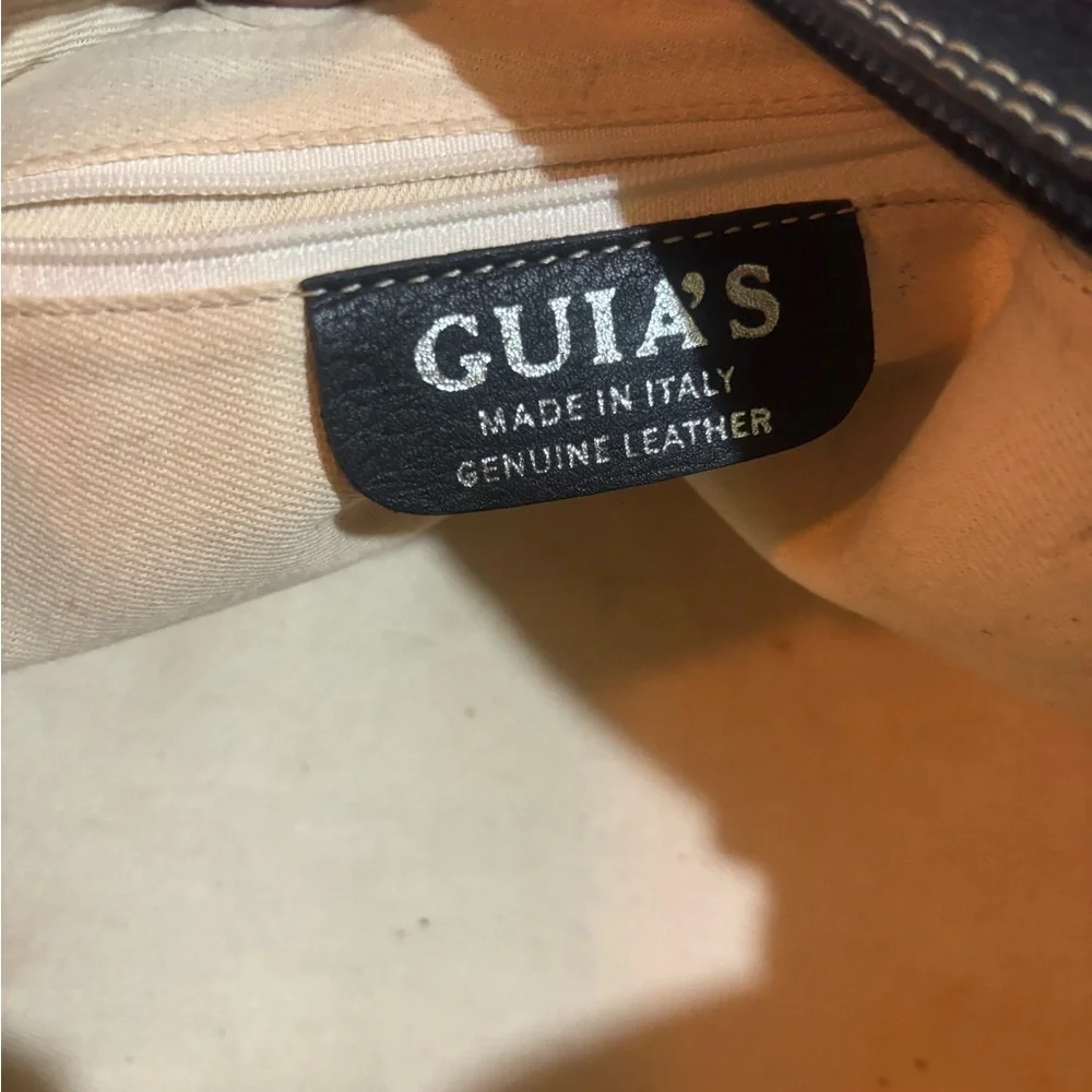 GUIA’S black leather satchel handbag with beige trim